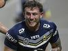 TOWNSVILLE, AUSTRALIA - MAY 04: Sam McIntyre of the Cowboys celebrates after scoring a try  during the round nine NRL match between North Queensland Cowboys and Dolphins at Qld Country Bank Stadium, on May 04, 2024, in Townsville, Australia. (Photo by Ian Hitchcock/Getty Images)