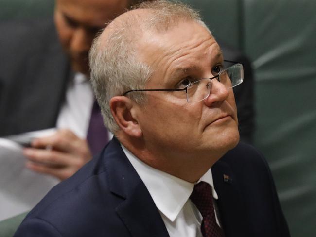 Treasurer Josh Frydenberg and Prime Minister Scott Morrison in Question Time in Parliament House in Canberra. Picture by Sean Davey.