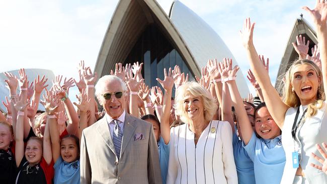 Charles and Camilla pose for a photo with students at the Sydney Opera House on October 22.. Picture: Chris Jackson/Getty Images