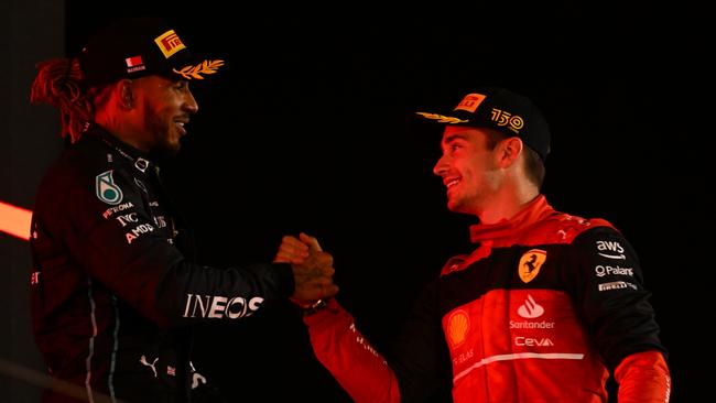 Race winner Charles Leclerc of Monaco and Ferrari and Third placed Lewis Hamilton