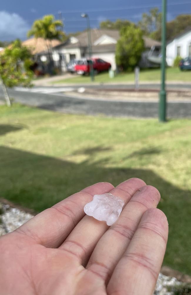 Reporter Asa Andersen found some hail in Maroochydore after the afternoon storms, which hit the Sunshine Coast about 2pm.