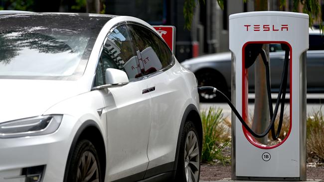 A Tesla at a charging station. Picture: NCA NewsWire / Naomi Jellicoe