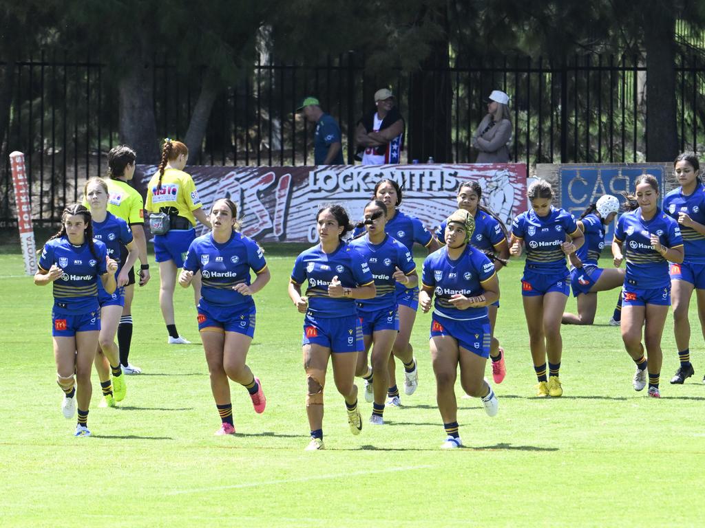 Parramatta returns for the kick-off after scoring. Picture: Martin Ollman