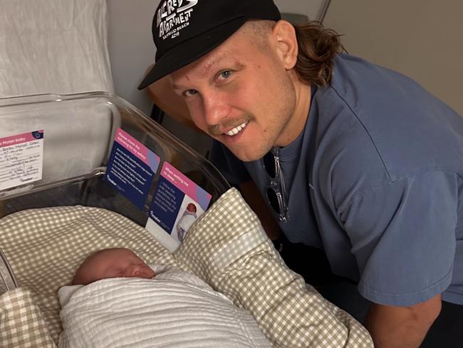 Reuben Cotter with his newborn son, Banks. Photo: Supplied.