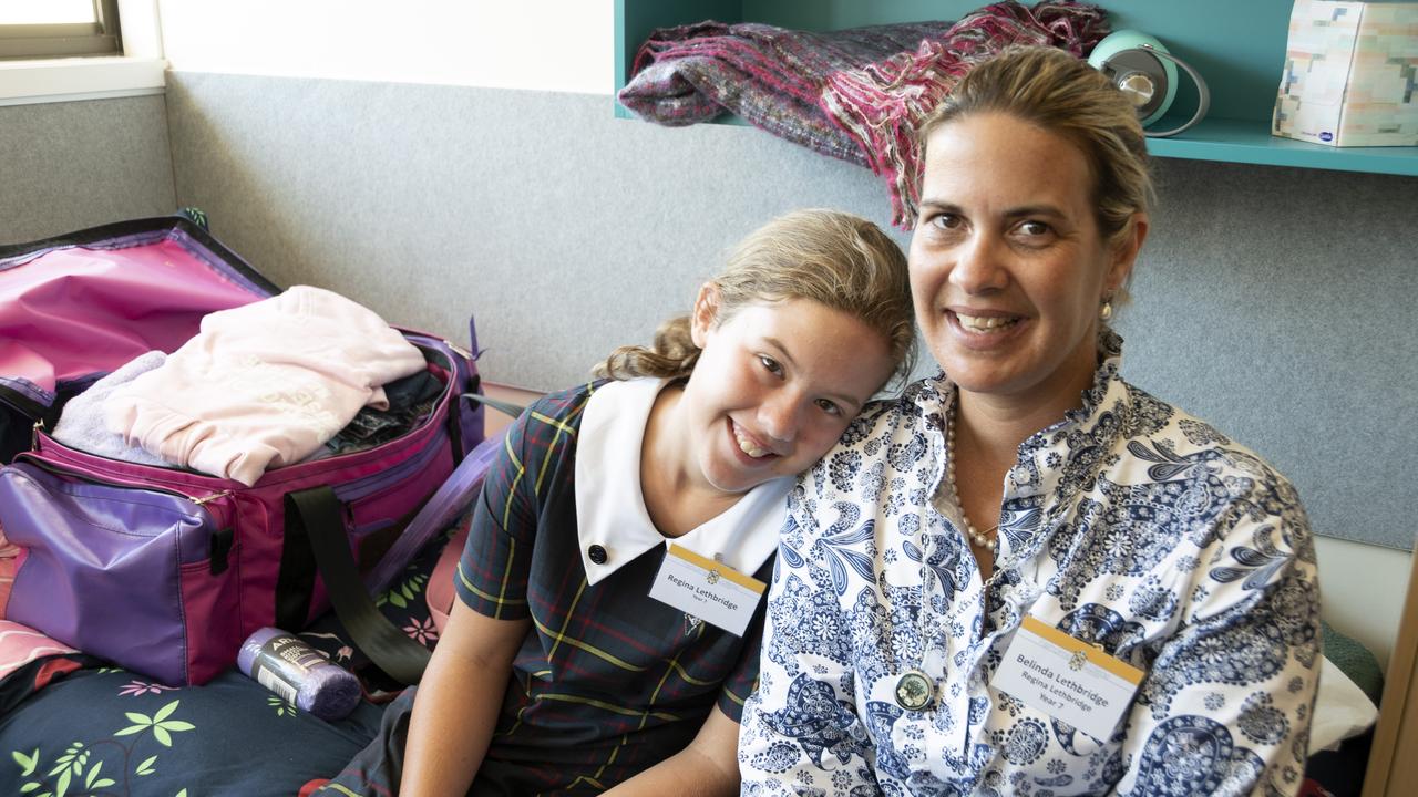 SCHOOL TIME: After travelling from Western Australia, Year 7 boarder Regina Lethbridge was settling into her new room at Fairholme College today with help from her mum Belinda Lethbridge. Photo: Bev Lacey