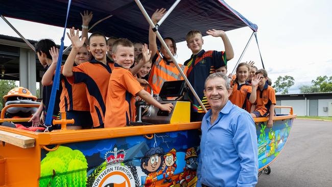 Gerard Maley Deputy Chief Minister with Girraween Primary School students tour the NTES Palmerston Volunteer Unit, meeting Paddy the Platypus and testing out the emergency sirens. Picture: Pema Tamang Pakhrin