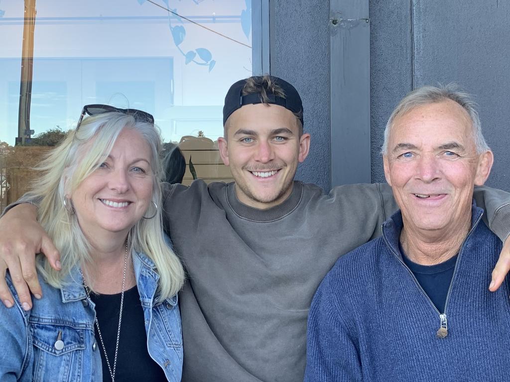 Callan Sinclair with his mother Gai and father Terry.