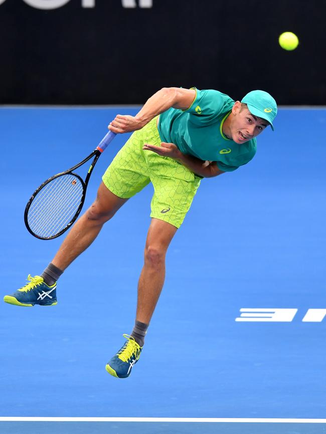 Alex De Minaur serves to Michael Mmoh.