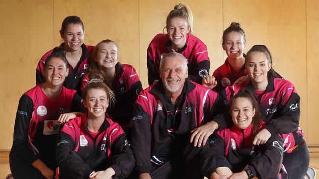 Tango Netball Club coach Scott Waddington with players (LtoR back) Ashleigh Thiel, Sarah Raper, Jess Ward, Charlotte Veart, Jessica Curnow, Kelsey Williams, and (LtoR front), Che Revill, Scott, and Carla Roocke. Picture: AAP/Dean Martin.