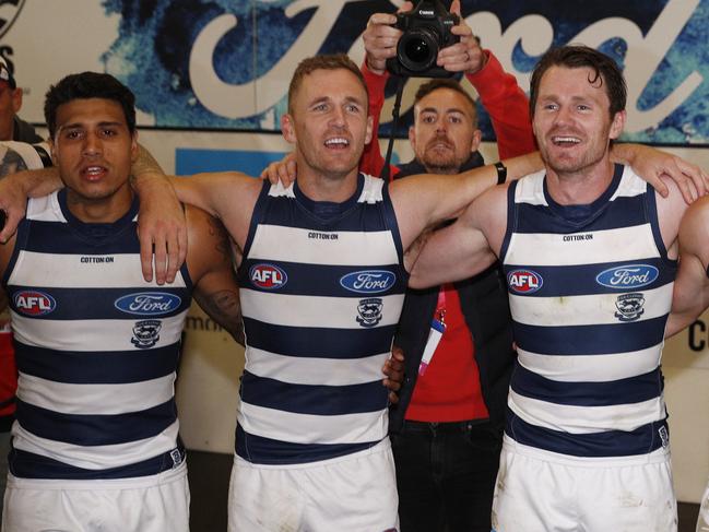 Tim Kelly, Joel Selwood, Patrick Dangerfield, Mitch Duncan, Gary Rohan of the Cats sing the team song after the Round 5 AFL match between the Hawthorn Hawks and the Geelong Cats at the MCG in Melbourne, Monday, April 22, 2019. (AAP Image/Daniel Pockett) NO ARCHIVING, EDITORIAL USE ONLY