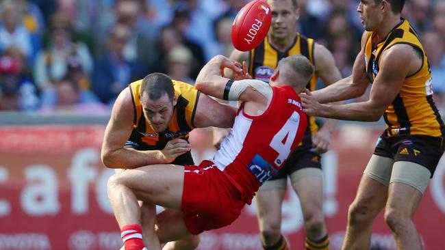 The Swans haven’t been the same in Grand Finals since this Jarryd Roughead tackle on Dan Hannebery. Picture: Michael Klein