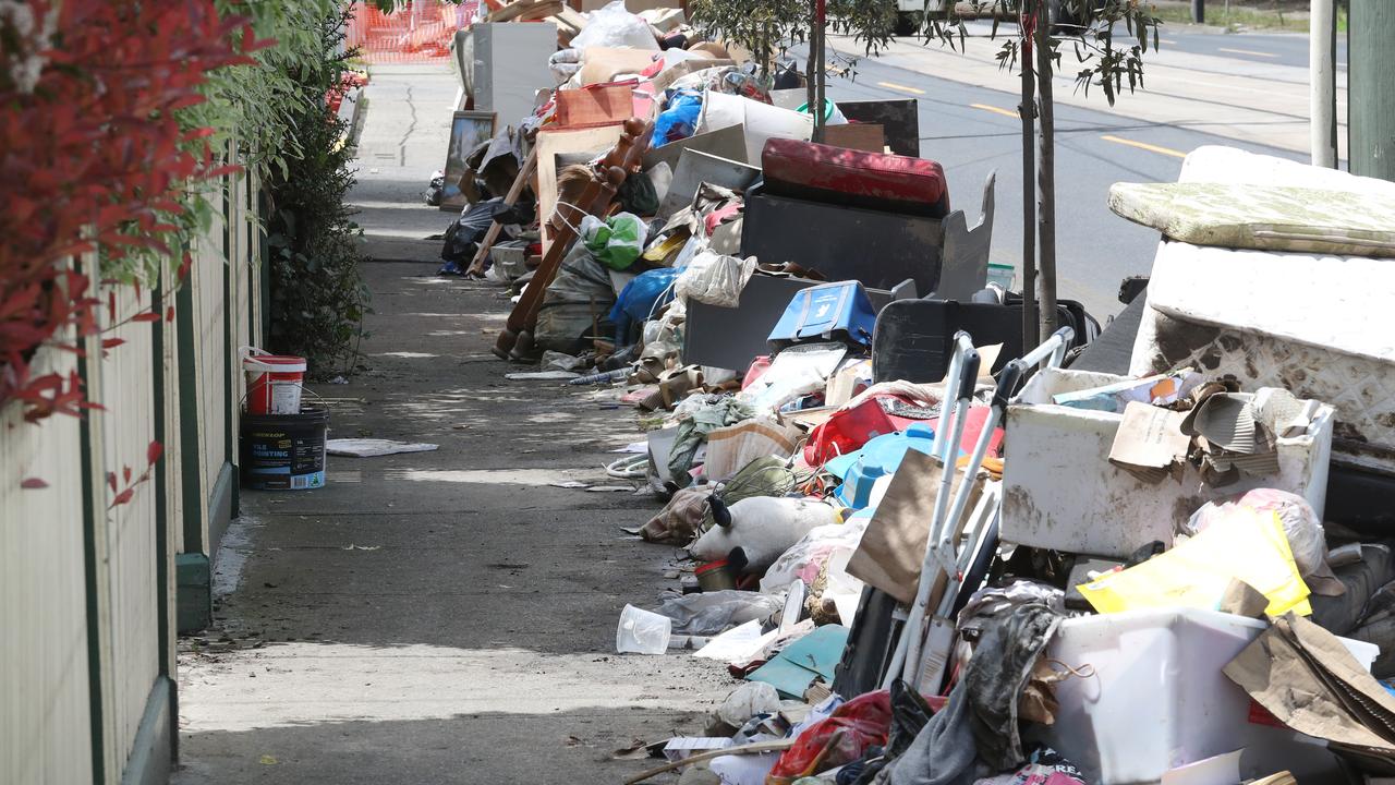 Rubbish littered the roadside after the flood clean up. Picture: NCA NewsWire/David Crosling.