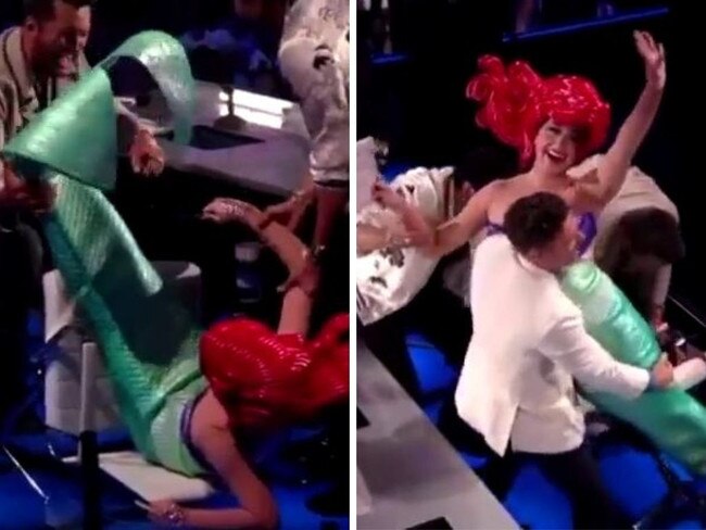 Katy Perry falls out of chair on American Idol