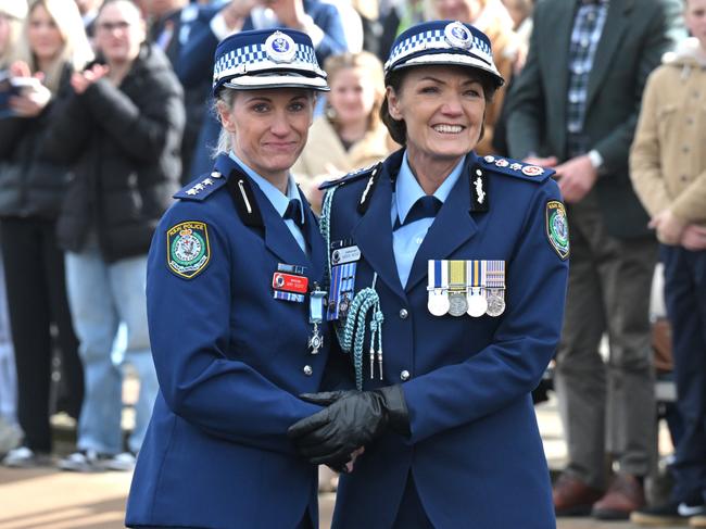 Scott receives the Commissioner's Valour Award from NSW Police Commissioner Karen Webb following her brave act. Picture: POOL/NewsWire/Mick Tsikas