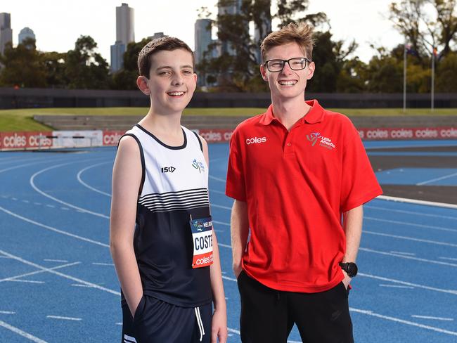 Multi-class athlete Liam Costello is eligible to compete for the first time at the Little Championships, thanks to the historic move to inclusion. He’s with Little Athletics ambassador and Paralympian Jaryd Clifford. Picture: Josie Hayden