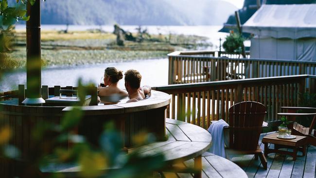 An outdoor spa at an Waterfront ensuite luxury tent at the Clayoquot Wilderness Resort.