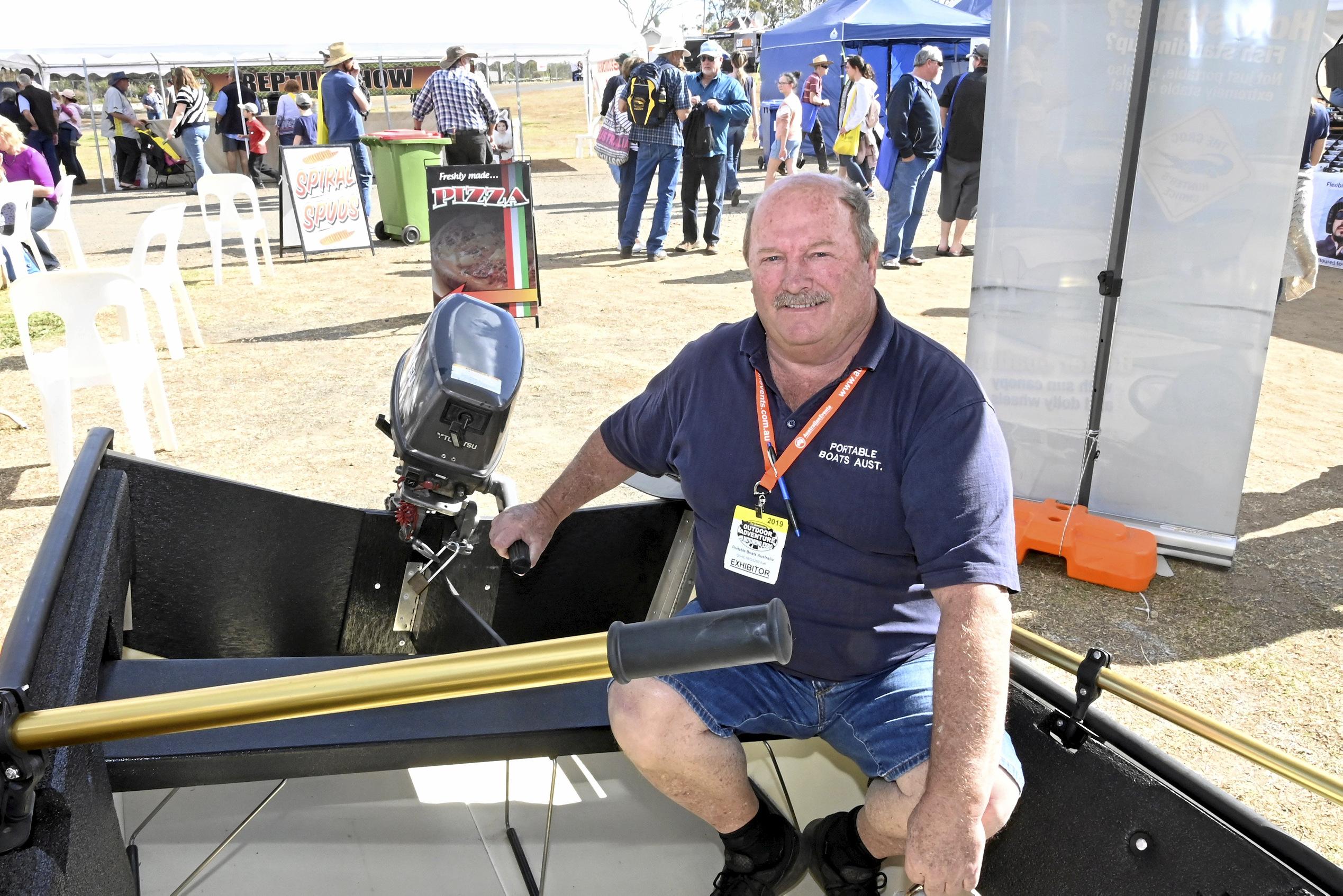 Colin Robinson of Portable Boats Australia demonstrates the fold up dingy at the Queensland Outdoor Adventure and Motoring Expo at the Toowoomba Showgrounds. Queensland Outdoor Adventure & Motoring Expo. August 2019. Picture: Bev Lacey