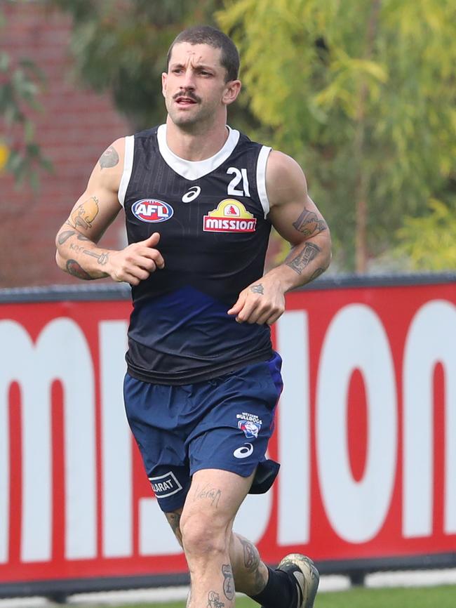 Tom Liberatore jogs laps at training on Thursday. Picture: David Crosling