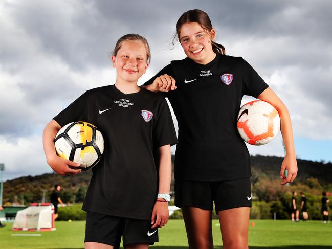 South Hobart Soccer Club youth development squad members Clara McGrath, 12, and Asha Nicol, 13. Picture: Nikki Davis-Jones