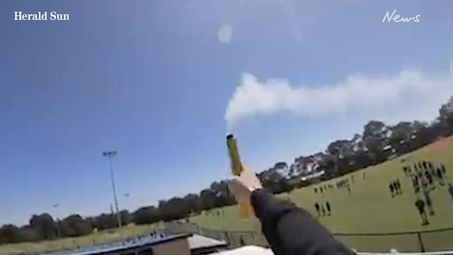 The youth lights the flare on the school’s roof. Picture: Supplied