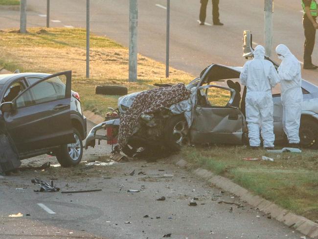 Police investigate the scene of a horror crash on Trower Rd at Lakeside Drv overnight.Picture Glenn Campbell