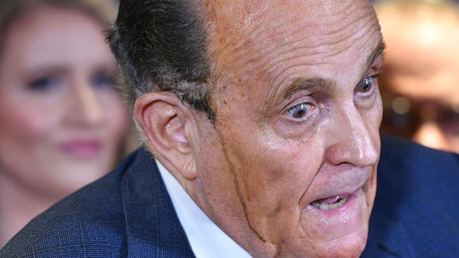 Trump's lawyer Rudy Giuliani perspires as he speaks during a press conference at the Republican National Committee headquarters in Washington, DC, on November 19. Picture: AFP