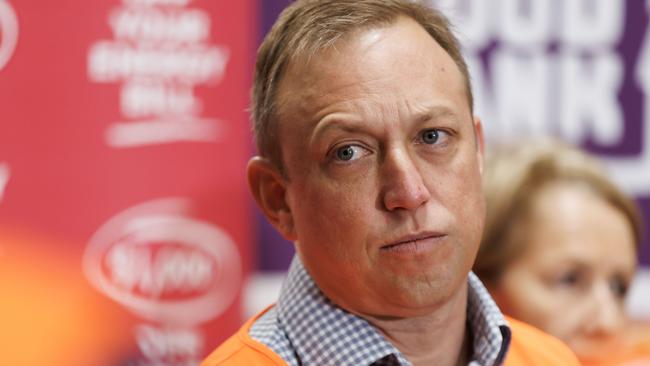 Premier Steven Miles addresses the media at Foodbanks warehouse facility at Morningside on Sunday morning. Picture Lachie Millard