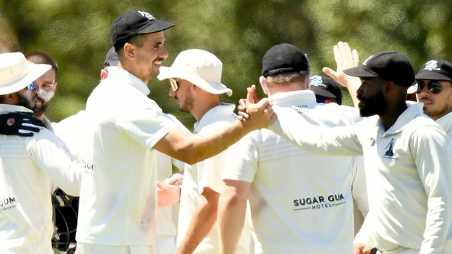 Stefon King of Sydenham Hillside is congratulated by team mates after taking the wicket of Mitchell Pittaway of St Albans during the Victorian Turf Cricket Association match between St Albans and Sydenham Hillside at Kings Park, on February 3, 2024, in Melbourne, Australia. (Photo by Josh Chadwick)