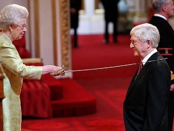 Michael Parkinson was knighted by the Queen in 2008. Picture: AFP