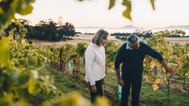 Bruce Dunbabin and Jo Oliver, Mayfield Estate, in the vineyard down in Tasmania. Pictures: Supplied