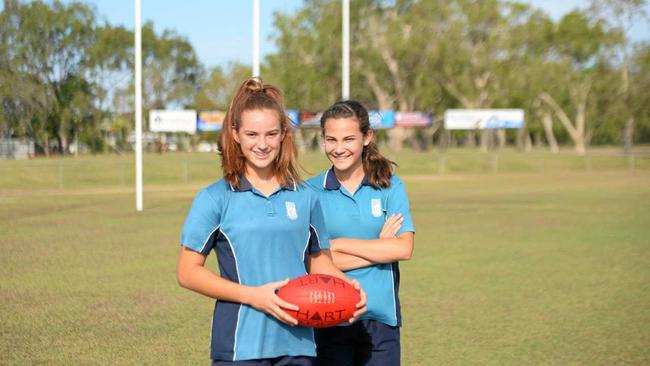 DUAL SPORTS STAR: Emily Bella (left) and Indiana Brough from Mercy College Mackay before taking on the Tribal Sport AFL Queensland Schools Cup state finals. Picture: Aidan Cureton