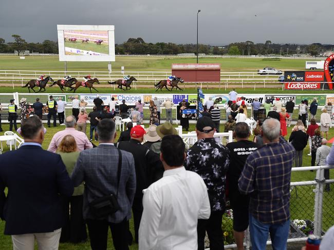 The Ladbrokes 2024 Moe Cup is held at Moe Horse Racing Club, Moe Victoria, Friday 18th October 2024. Image of racegoers enjoying a race on Cup Day. Picture: Andrew Batsch