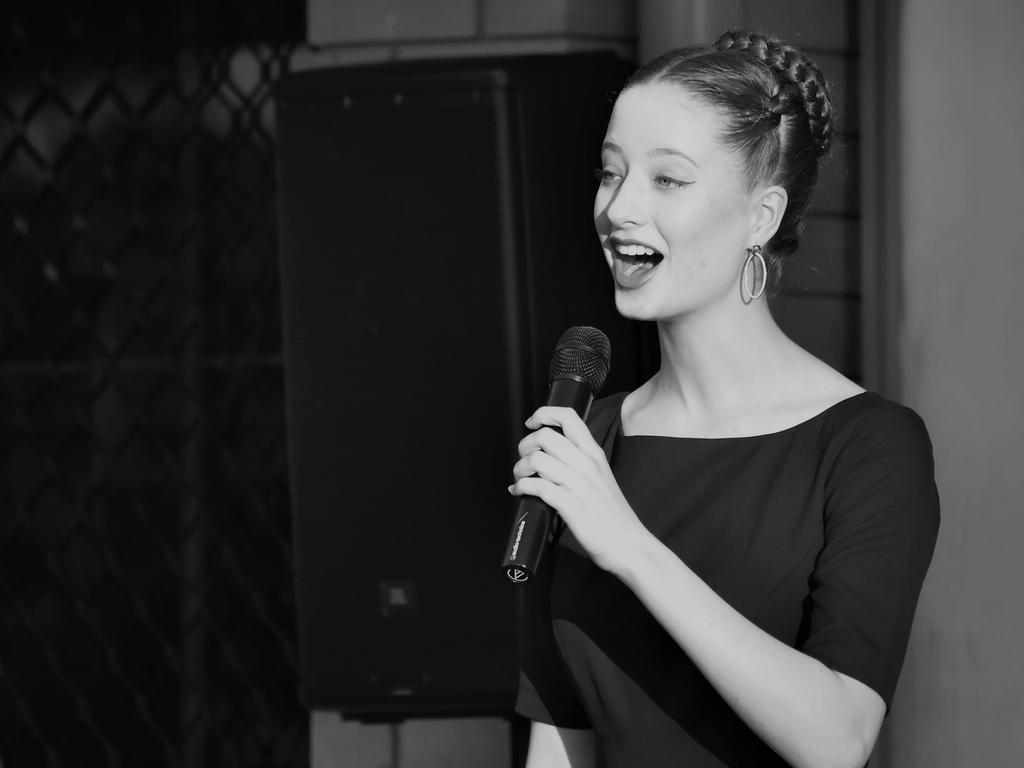 Alicia Kyriazis singing the national anthem at the official opening of the US Kids Golf Foundation Australian Open at the Rockhampton Golf Club on September 26.