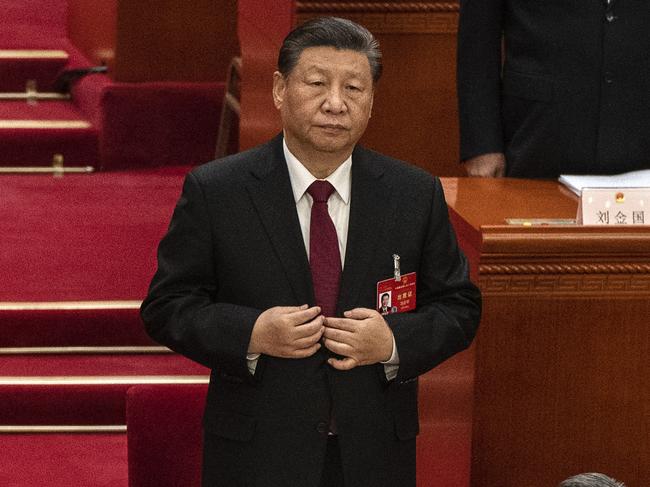 BEIJING, CHINA - MARCH 5: Chinese President Xi Jinping stands during the opening of the NPC, or National People's Congress, at the Great Hall of the People on March 5, 2024 in Beijing, China. China's annual political gathering known as the Two Sessions will convene leaders and lawmakers to set the government's agenda for domestic economic and social development for the year. (Photo by Kevin Frayer/Getty Images)