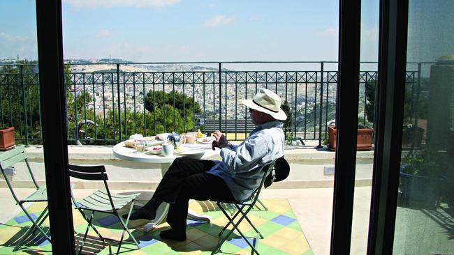 Lyons on his balcony. Picture: Sylvie Le Clezio