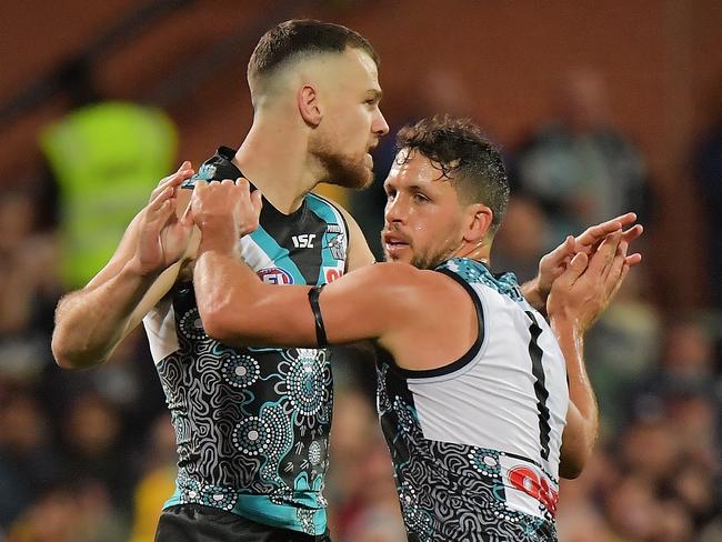 ADELAIDE, AUSTRALIA - JUNE 08: (L-R) Robbie Gray of the Power celebrates with Travis Boak of the Power after kicking ad goal uring the round 12 AFL match between the Port Adelaide Power and the Richmond Tigers at Adelaide Oval on June 8, 2018 in Adelaide, Australia.  (Photo by Daniel Kalisz/Getty Images)