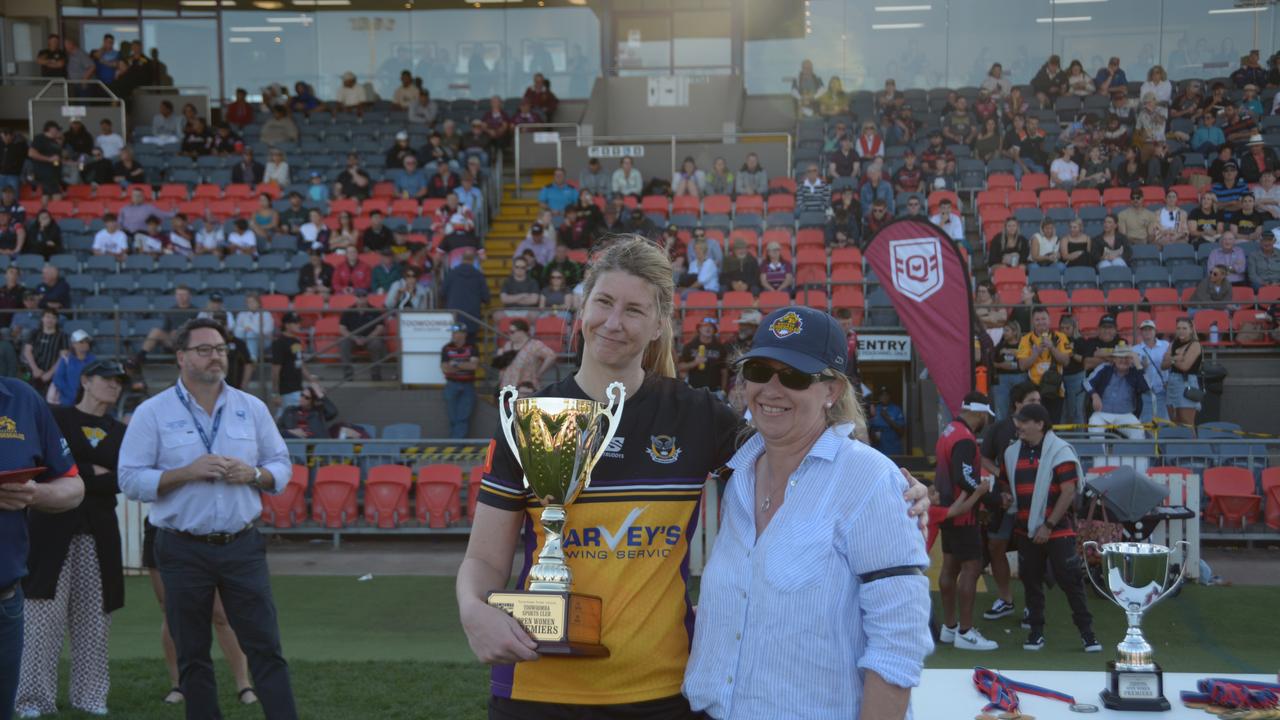 Gatton Hawks women's captain Kimberley Dore receives the trophy on TRL grand final day at Clive Berghofer Stadium on Saturday September 16, 2023.