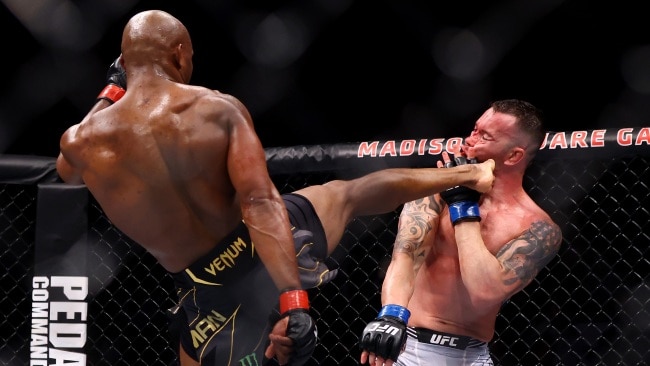 Kamaru Usman kicks Colby Covington in their welterweight title bout during the UFC 268 event at Madison Square Garden. (Photo by Mike Stobe/Getty Images)