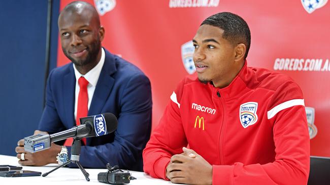 Adelaide United signing Michael Maria with Reds director of football Bruce Djite. Picture: Tom Huntley