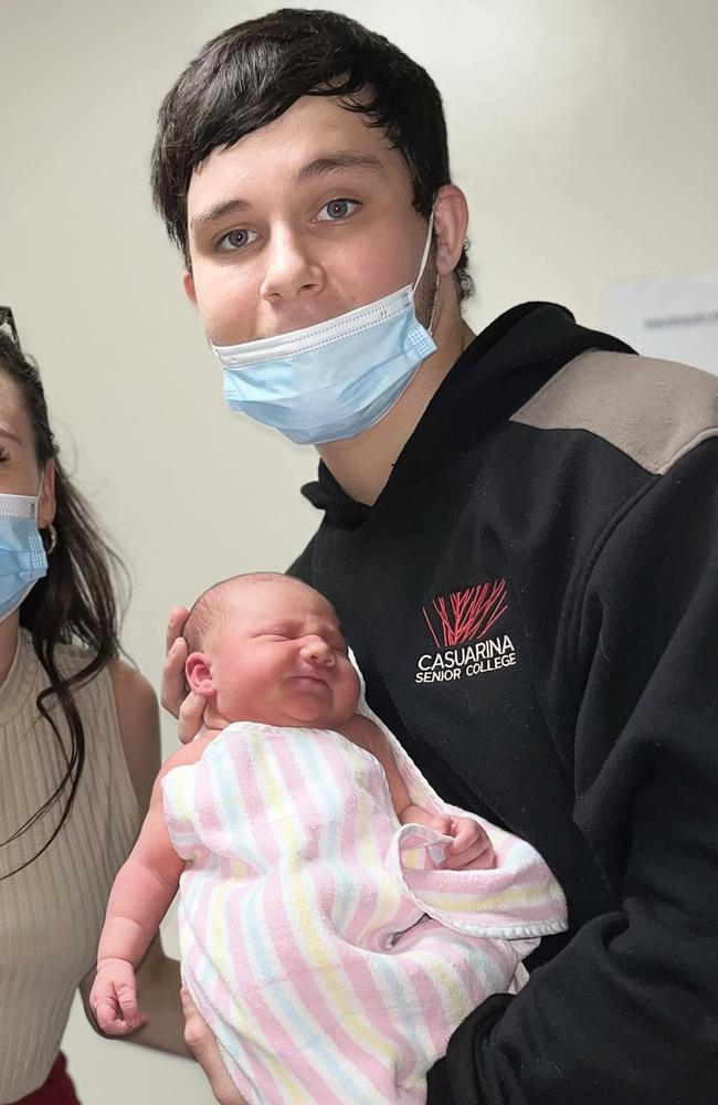 18-year-old Kingsley 'Junior' Alley holding his newborn daughter Eleanor.