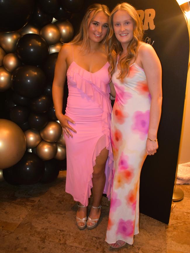 Gemma Van De Rydt and Darcy Eenjes having a great night at the Cowwarr Saints Football &amp; Netball Club Golden Gala Ball 2024. Picture: Jack Colantuono