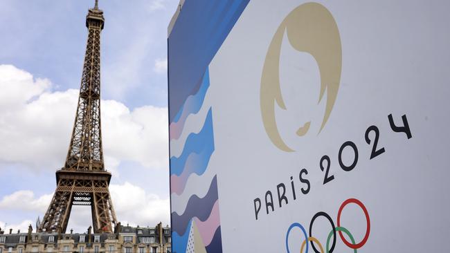 PARIS, FRANCE - JUNE 17: The Paris 2024 logo is displayed near the Eiffel Tower before the start of the Paris 2024 Olympic and Paralympic Games on June 17, 2024 in Paris, France. The city is gearing up to host the XXXIII Olympic Summer Games, from 26 July to 11 August. (Photo by Chesnot/Getty Images)Escape 7 July 2024Doc updatesPhoto - Getty Images