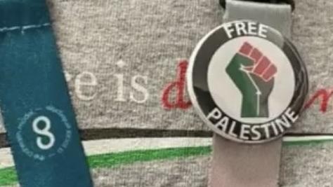 A healthcare worker wearing pro-Palestine badges and attire. Picture: Supplied