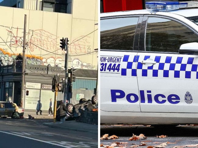 A car has been flipped onto its roof following a three car collision, with one person reportedly still trapped inside.