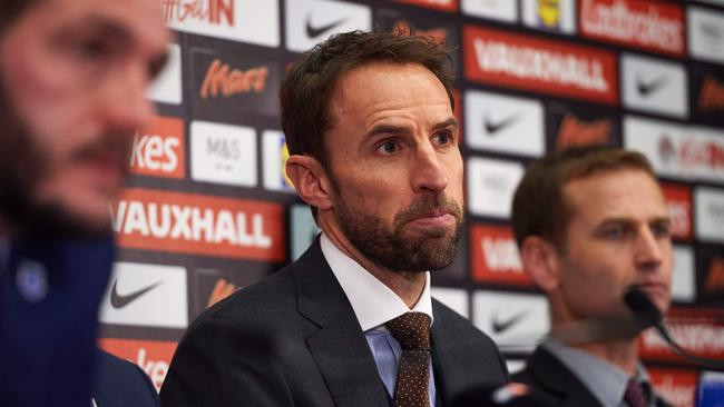 England's new manager Gareth Southgate (C).