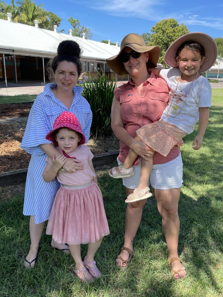 Miranda Nelson, 34, with Charlie Nelson, 5, and Teaghan Mills, 31, with Isabelle Mills, 4, at the Australia Day Mullet Throwing Championship in Ocean Shores on January 26. Picture: Savannah Pocock.