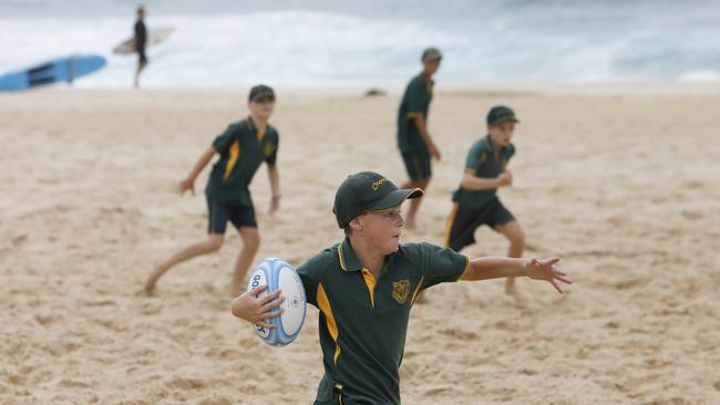 Students from Sydney public schools playing ball games at the Play for Fun launch at Maroubra Beach. Picture: Quentin Jones