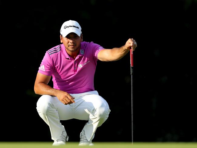 Jason Day of Australia lines up a putt on the 16th green during the final round of the U.S. Open