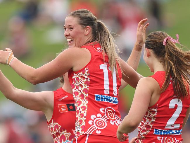 SYDNEY, AUSTRALIA - NOVEMBER 02: Bella R. Smith of the Swans celebrates kicking a goal during the round 10 AFLW match between Sydney Swans and West Coast Eagles at Henson Park, on November 02, 2024, in Sydney, Australia. (Photo by Mark Metcalfe/AFL Photos/via Getty Images)