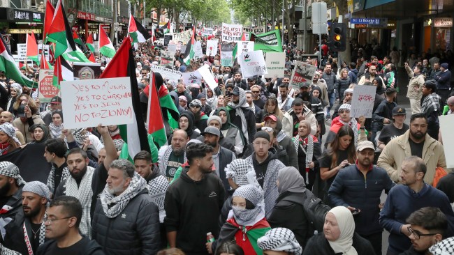 People participate in a rally against the occupation of Palestine and the conflict between Israel and Hamas in Melbourne CBD. Sunday, October 15, 2023. Picture: David Crosling